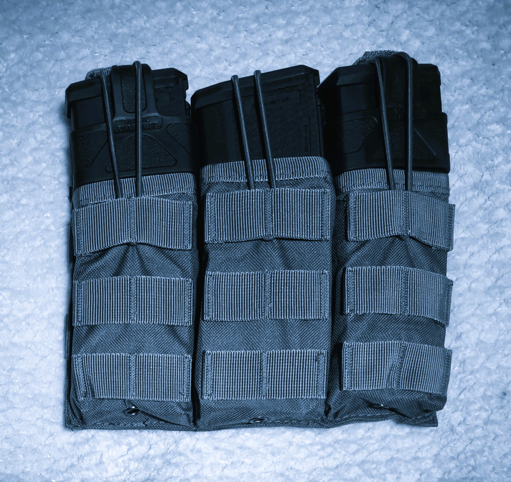 A real photo of Modular Triple Mag Pouch for 5.56 type 8Fields Black by Solo (2)