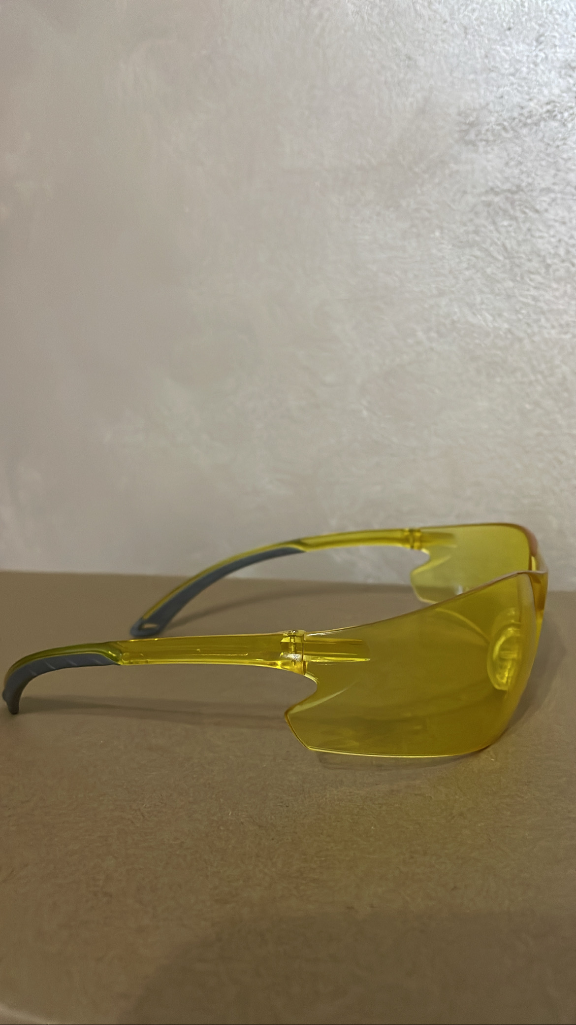 A real photo of Protection Glasses Swiss Arms yellow by Grigoras Marius (1)