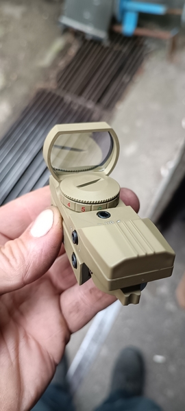 A real photo of Red Dot Open Reflex Theta Optic TAN by TomiaMedve (1)
