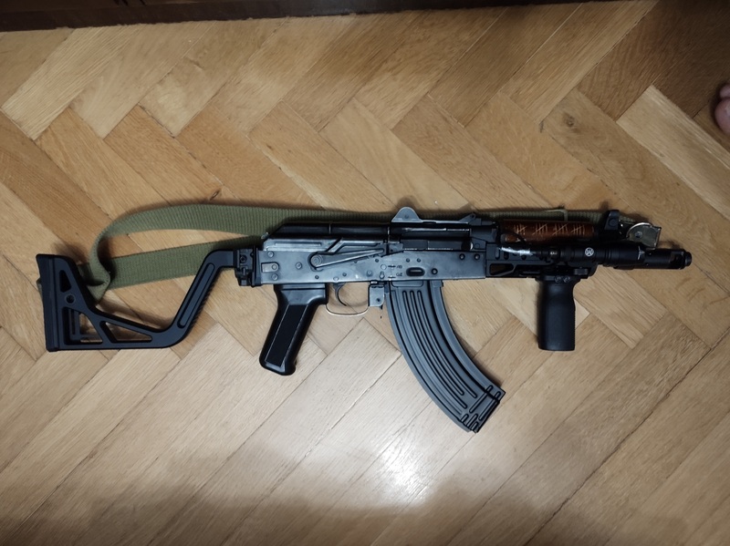A real photo of Montura curea cu buton ACM by Simi (5)