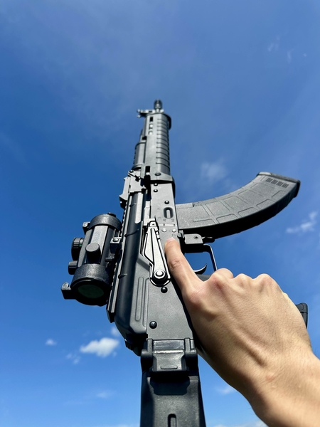 A real photo of Assault rifle CM.077 Cyma by Poip (2)